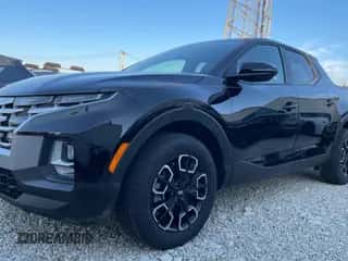 2022 Hyundai Santa Cruz SEL z VIN 5NTJBDAEXNH013883, wystawiony jako Copart lot #73432394 z przebiegiem 15 329 mil mil oraz Szkoda całkowita • Salvage title. Historia ofert i sprzedaży dostępna na DreamBid. Obrazek 2.