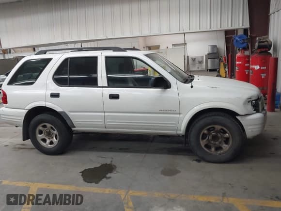 ✅ 2004 Isuzu Rodeo S • VIN: 4S2CK58W244301482 • Lot: 43614335. Wystawiony na IAAI z przebiegiem 163 277 mil. Bezpłatny archiwum sprzedaży aukcyjnych z USA i szczegółowy raport historii pojazdu na DreamBid. Zdjęcie 13.