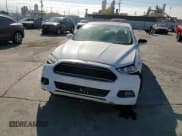 ✅ 2016 Ford Fusion SE Hybrid • VIN: 3FA6P0LU9GR157112 • Lot: 80173065. Listed on Copart with 84,969 mi. Free auction sales archive from the USA and detailed vehicle history report at DreamBid. Image 13.