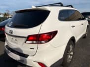 ✅ 2017 Hyundai Santa Fe SE • VIN: KM8SNDHF6HU224058 • Lot: 92270305. Listed on Copart with 142,941 mi. Free auction sales archive from the USA and detailed vehicle history report at DreamBid. Image 4.