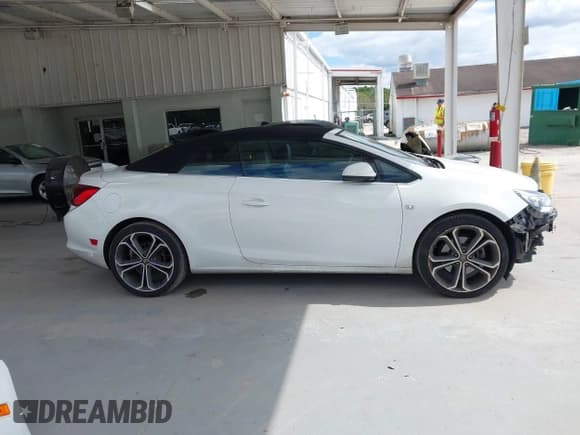 ✅ 2016 Buick Cascada Premium • VIN: W04WT3N50GG054112 • Lot: 43458520. Listed on IAAI with 136,691 mi. Free auction sales archive from the USA and detailed vehicle history report at DreamBid. Image 14.