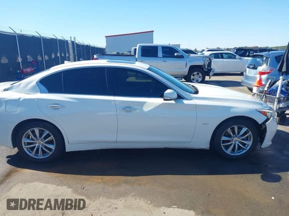 ✅ 2017 Infiniti Q50 Premium • VIN: JN1CV7AR9HM681058 • Лот: 43660044. Опубликован ранее на IAAI с пробегом 185 432 миль. Бесплатный доступ к архиву аукционных продаж из США и подробный отчёт об истории автомобиля на DreamBid. Изображение 13.