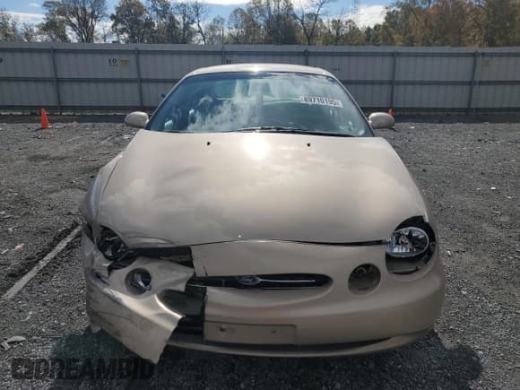 ✅ 1999 Ford Taurus SE • VIN: 1FAFP53S0XA141970 • Lot: 89710195. Listed on Copart with 170,401 mi. Free auction sales archive from the USA and detailed vehicle history report at DreamBid. Image 5.