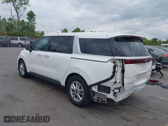 ✅ 2023 Kia Carnival LX • VIN: KNDNB4H34P6254954 • Lot: 42033166. Listed on IAAI with 42,151 mi. Free auction sales archive from the USA and detailed vehicle history report at DreamBid. Image 3.