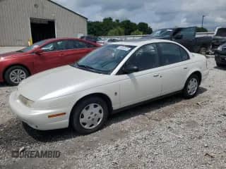 1998 Saturn SL with VIN 1G8ZK5278WZ267717, listed as a Copart auction lot 64542025 with 158,503 mi miles and Salvage title. Bid and sale history available at DreamBid. Image 1.
