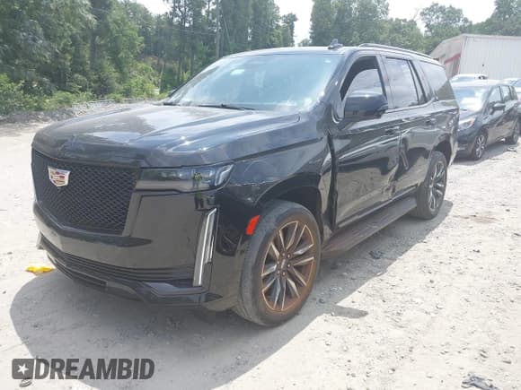 ✅ 2023 Cadillac Escalade 4WD Sport • VIN: 1GYS4EKL4PR415940 • Лот: 42782247. Опубликован ранее на IAAI с пробегом 48 681 миль. Бесплатный доступ к архиву аукционных продаж из США и подробный отчёт об истории автомобиля на DreamBid. Изображение 2.