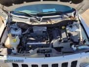 ✅ 2010 Jeep Patriot Sport • VIN: 1J4NT2GA7AD502905 • Лот: 41705146. Опубликован ранее на IAAI с пробегом 158 651 миль. Бесплатный доступ к архиву аукционных продаж из США и подробный отчёт об истории автомобиля на DreamBid. Изображение 11.