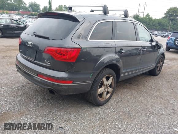 ✅ 2015 Audi Q7 Premium Plus • VIN: WA1LGAFEXFD013108 • Lot: 42916933. Listed on IAAI with 106,607 mi. Free auction sales archive from the USA and detailed vehicle history report at DreamBid. Image 4.