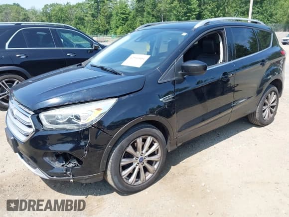 ✅ 2018 Ford Escape Titanium • VIN: 1FMCU9J9XJUA58366 • Lot: 42941884. Listed on IAAI with 157,052 mi. Free auction sales archive from the USA and detailed vehicle history report at DreamBid. Image 2.