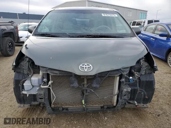 ✅ 2012 Toyota Sienna LE • VIN: 5TDJK3DC7CS039741 • Lot: 91675575. Listed on Copart with 215,437 mi. Free auction sales archive from the USA and detailed vehicle history report at DreamBid. Image 5.