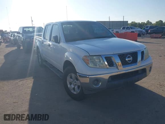 ✅ 2010 Nissan Frontier SE • VIN: 1N6AD0ER5AC402545 • Lot: 43305489. Listed on IAAI with 185,332 mi. Free auction sales archive from the USA and detailed vehicle history report at DreamBid. Image 1.