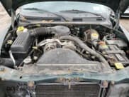 ✅ 1999 Dodge Dakota SLT • VIN: 1B7GG22X4XS309050 • Lot: 82030864. Wystawiony na Copart z przebiegiem 141 396 mil. Bezpłatny archiwum sprzedaży aukcyjnych z USA i szczegółowy raport historii pojazdu na DreamBid. Zdjęcie 11.