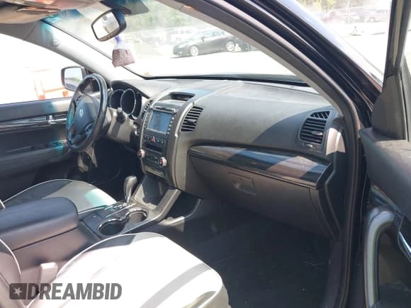 ✅ 2012 Kia Sorento SX • VIN: 5XYKW4A2XCG232506 • Лот: 42740284. Опубликован ранее на IAAI с пробегом 140 990 миль. Бесплатный доступ к архиву аукционных продаж из США и подробный отчёт об истории автомобиля на DreamBid. Изображение 5.