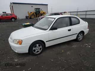 2002 Hyundai Accent with VIN KMHCF35G52U207137, listed as a Copart auction lot 82818574 with 185,177 mi miles and Salvage title. Bid and sale history available at DreamBid. Image 1.