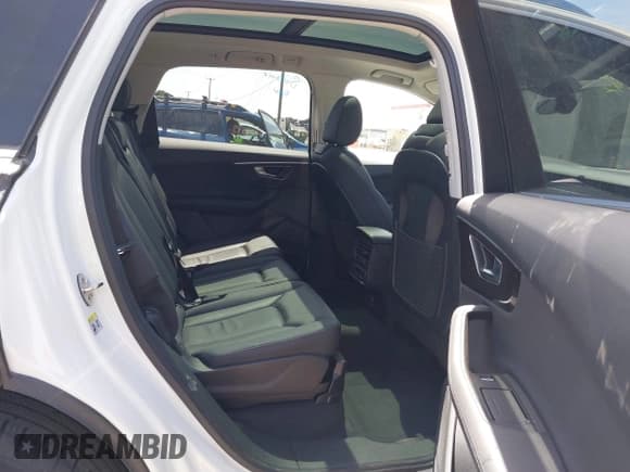 ✅ 2023 Audi Q7 Premium Plus • VIN: WA1LXBF79PD010404 • Lot: 42207521. Listed on IAAI with 30,589 mi. Free auction sales archive from the USA and detailed vehicle history report at DreamBid. Image 8.