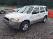 ✅ 2001 Ford Escape • VIN: 1FMYU03B51KB64348 • Lot: 42829467. Listed on IAAI with 362,807 mi. Free auction sales archive from the USA and detailed vehicle history report at DreamBid. Image 2.