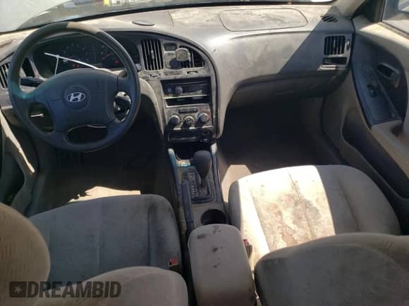 2005 Hyundai Elantra GLS z VIN KMHDN46D35U149616, wystawiony jako Copart lot #81009975 z przebiegiem 233 904 mil mil oraz Szkoda całkowita • Salvage title. Historia ofert i sprzedaży dostępna na DreamBid. Obrazek 8.