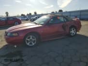 ✅ 2004 Ford Mustang Deluxe • VIN: 1FAFP44604F242565 • Lot: 49583155. Listed on Copart with Not provided. Free auction sales archive from the USA and detailed vehicle history report at DreamBid. Image 1.