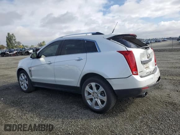 ✅ 2013 Cadillac SRX Premium Collection • VIN: 3GYFNJE39DS649339 • Лот: 83994355. Опубликован ранее на Copart с пробегом 104 618 миль. Бесплатный доступ к архиву аукционных продаж из США и подробный отчёт об истории автомобиля на DreamBid. Изображение 2.