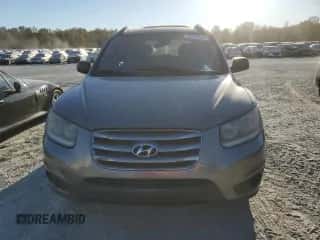 2012 Hyundai Santa Fe GLS z VIN 5XYZG3AB0CG122036, wystawiony jako Copart lot #76293294 z przebiegiem 182 407 mil mil oraz Czysty tytuł • Clean title. Historia ofert i sprzedaży dostępna na DreamBid. Obrazek 5.