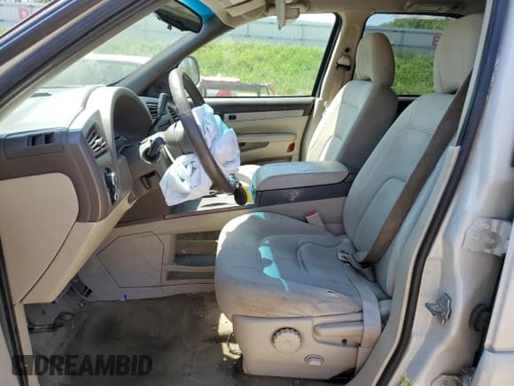 ✅ 2006 Buick Rendezvous • VIN: 3G5DA03L26S515062 • Lot: 55658784. Wystawiony na Copart z przebiegiem 213 802 mil. Bezpłatny archiwum sprzedaży aukcyjnych z USA i szczegółowy raport historii pojazdu na DreamBid. Zdjęcie 7.