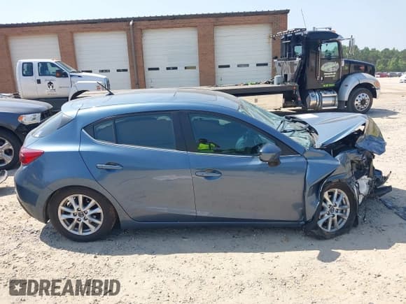 ✅ 2016 Mazda 3 i Touring • VIN: 3MZBM1L7XGM267257 • Lot: 42576066. Listed on IAAI with 46,617 mi. Free auction sales archive from the USA and detailed vehicle history report at DreamBid. Image 13.