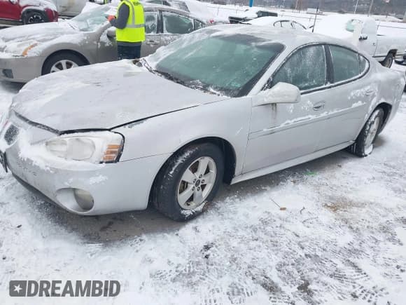 ✅ 2005 Pontiac Grand Prix • VIN: 2G2WP522651188928 • Lot: 43814437. Listed on IAAI with 254,648 mi. Free auction sales archive from the USA and detailed vehicle history report at DreamBid. Image 2.