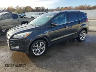 ✅ 2013 Ford Escape Titanium • VIN: 1FMCU0J90DUB12855 • Lot: 90996865. Listed on Copart with 141,517 mi. Free auction sales archive from the USA and detailed vehicle history report at DreamBid. Image 1.