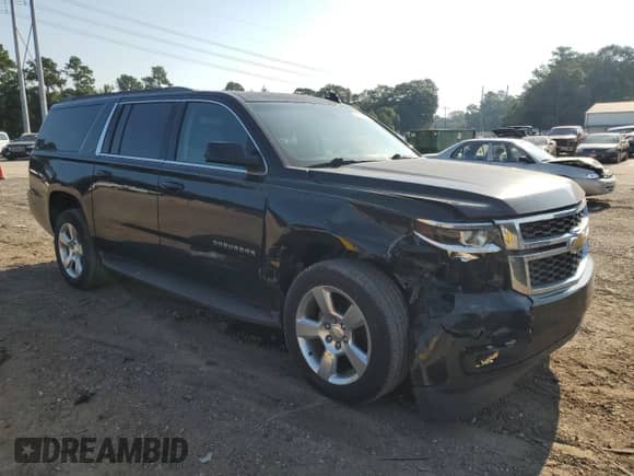 2016 Chevrolet Suburban LT with VIN 1GNSCHKC1GR152081, listed as a Copart auction lot 66030834 with 144,010 mi miles and Salvage title. Bid and sale history available at DreamBid. Image 4.