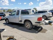 ✅ 1999 Ford F-150 • VIN: 1FTRX07W6XKB31655 • Lot: 70813555. Listed on Copart with 151,996 mi. Free auction sales archive from the USA and detailed vehicle history report at DreamBid. Image 2.