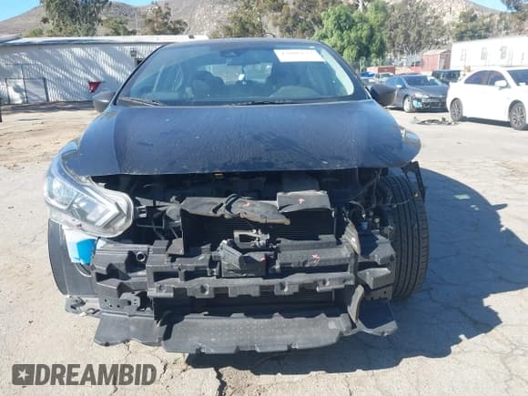 ✅ 2021 Nissan Versa S • VIN: 3N1CN8DV7ML816783 • Lot: 43806622. Listed on IAAI with 154,036 mi. Free auction sales archive from the USA and detailed vehicle history report at DreamBid. Image 13.