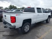 ✅ 2017 Chevrolet Silverado 2500HD LT • VIN: 1GC1KVEY9HF196250 • Lot: 41183166. Wystawiony na IAAI z przebiegiem 135 806 mil. Bezpłatny archiwum sprzedaży aukcyjnych z USA i szczegółowy raport historii pojazdu na DreamBid. Zdjęcie 4.
