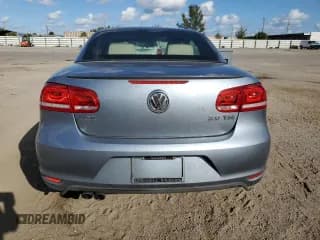 ✅ 2014 Volkswagen Eos Komfort • VIN: WVWBW8AH8EV004205 • Лот: 71463194. Опубликован ранее на Copart с пробегом 175 869 миль. Бесплатный доступ к архиву аукционных продаж из США и подробный отчёт об истории автомобиля на DreamBid. Изображение 6.