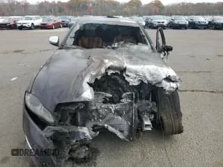 ✅ 2014 Jaguar XJ • VIN: SAJWJ1CD4E8V60190 • Lot: 90876975. Wystawiony na Copart z przebiegiem Nie podano. Bezpłatny archiwum sprzedaży aukcyjnych z USA i szczegółowy raport historii pojazdu na DreamBid. Zdjęcie 5.