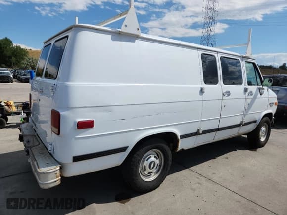 ✅ 1993 Chevrolet Chevy Van • VIN: 1GCEG25H3PF340021 • Lot: 69375045. Listed on Copart with 106,197 mi. Free auction sales archive from the USA and detailed vehicle history report at DreamBid. Image 3.
