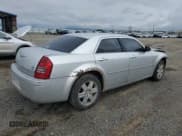 ✅ 2006 Chrysler 300 C • VIN: 2C3LK63HX6H133241 • Lot: 64862485. Wystawiony na Copart z przebiegiem 148 771 mil. Bezpłatny archiwum sprzedaży aukcyjnych z USA i szczegółowy raport historii pojazdu na DreamBid. Zdjęcie 3.