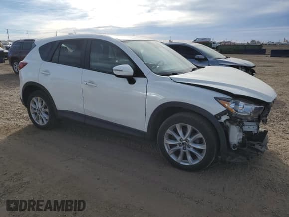 ✅ 2015 Mazda CX-5 Grand Touring • VIN: JM3KE4DY0F0474192 • Lot: 92506225. Wystawiony na Copart z przebiegiem 55 947 mil. Bezpłatny archiwum sprzedaży aukcyjnych z USA i szczegółowy raport historii pojazdu na DreamBid. Zdjęcie 4.