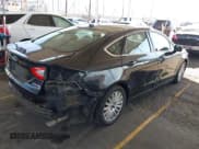 ✅ 2014 Ford Fusion SE Luxury • VIN: 3FA6P0PU1ER383118 • Lot: 42853683. Listed on IAAI with 297,364 mi. Free auction sales archive from the USA and detailed vehicle history report at DreamBid. Image 4.