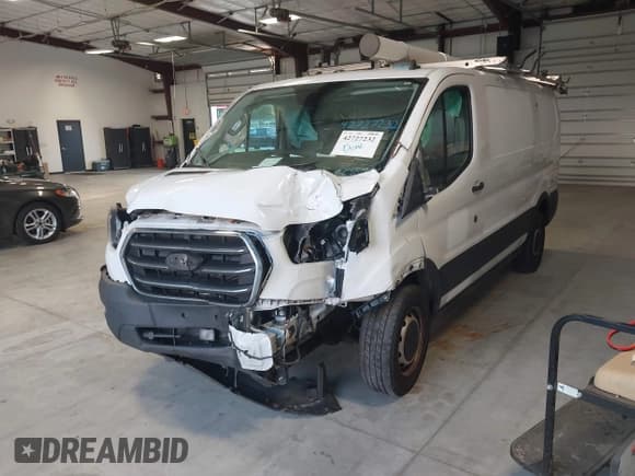 ✅ 2020 Ford Transit Cargo • VIN: 1FTBR1Y81LKA19650 • Lot: 42727232. Listed on IAAI with 103,676 mi. Free auction sales archive from the USA and detailed vehicle history report at DreamBid. Image 17.