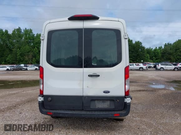 ✅ 2020 Ford Transit Cargo • VIN: 1FTBR1C89LKA80798 • Lot: 42123344. Listed on IAAI with 64,773 mi. Free auction sales archive from the USA and detailed vehicle history report at DreamBid. Image 17.