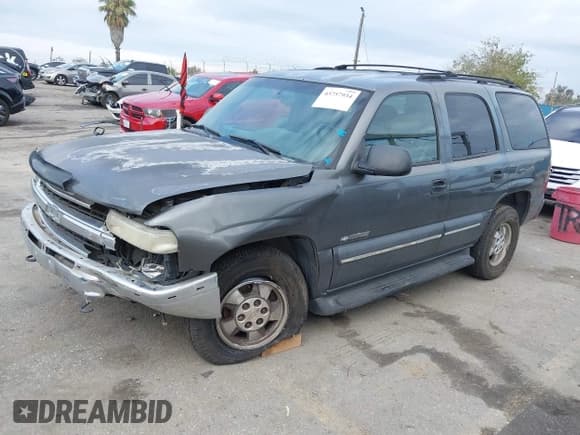 ✅ 2002 Chevrolet Tahoe LS • VIN: 1GNEC13T02R220544 • Lot: 43757934. Listed on IAAI with 194,467 mi. Free auction sales archive from the USA and detailed vehicle history report at DreamBid. Image 2.