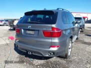 ✅ 2012 BMW X5 35d • VIN: 5UXZW0C59CL663582 • Lot: 43671625. Listed on IAAI with 193,230 mi. Free auction sales archive from the USA and detailed vehicle history report at DreamBid. Image 4.
