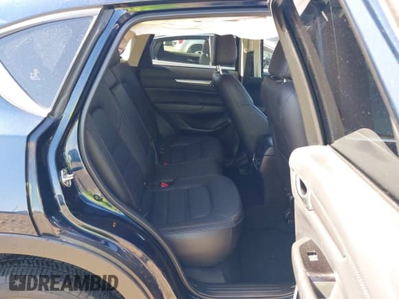 ✅ 2023 Mazda CX-5 S Carbon Edition • VIN: JM3KFBCM2P0250701 • Lot: 42272818. Listed on IAAI with 11,949 mi. Free auction sales archive from the USA and detailed vehicle history report at DreamBid. Image 8.