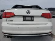 ✅ 2017 Volkswagen Jetta GLI • VIN: 3VW5T7AJ6HM311919 • Lot: 53295365. Listed on Copart with 136,673 mi. Free auction sales archive from the USA and detailed vehicle history report at DreamBid. Image 6.