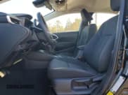 ✅ 2025 Toyota Corolla Hybrid LE • VIN: JTDBDMHEXS3025588 • Lot: 87416015. Listed on Copart with 4,790 mi. Free auction sales archive from the USA and detailed vehicle history report at DreamBid. Image 7.