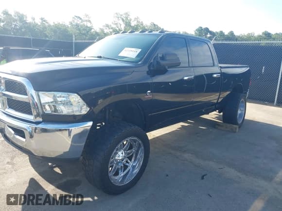 ✅ 2015 Ram 2500 Tradesman • VIN: 3C6UR5CL9FG705658 • Lot: 42729218. Listed on IAAI with 114,164 mi. Free auction sales archive from the USA and detailed vehicle history report at DreamBid. Image 2.
