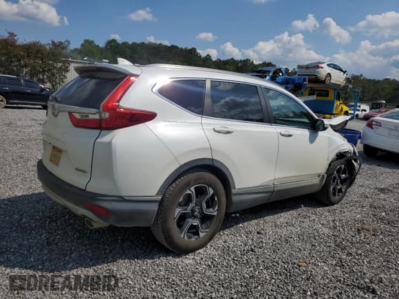 ✅ 2019 Honda CR-V Touring • VIN: 2HKRW1H97KH502900 • Лот: 80459225. Опубликован ранее на Copart с пробегом 75 717 миль. Бесплатный доступ к архиву аукционных продаж из США и подробный отчёт об истории автомобиля на DreamBid. Изображение 3.