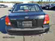 2005 Hyundai Accent GLS with VIN KMHCG45C15U662362, listed as a Copart auction lot 80574774 with 122,898 mi miles and Salvage title. Bid and sale history available at DreamBid. Image 6.