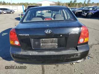 2005 Hyundai Accent GLS with VIN KMHCG45C15U662362, listed as a Copart auction lot 80574774 with 122,898 mi miles and Salvage title. Bid and sale history available at DreamBid. Image 6.