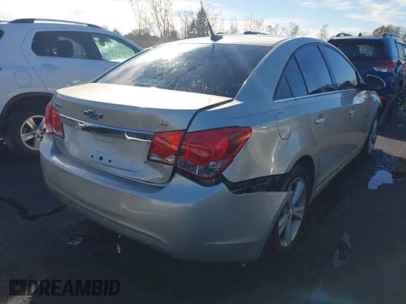 2014 Chevrolet Cruze 2LT with VIN 1G1PE5SBXE7257699, listed as a IAAI auction lot 43514227 with 131,115 mi miles and . Bid and sale history available at DreamBid. Image 6.